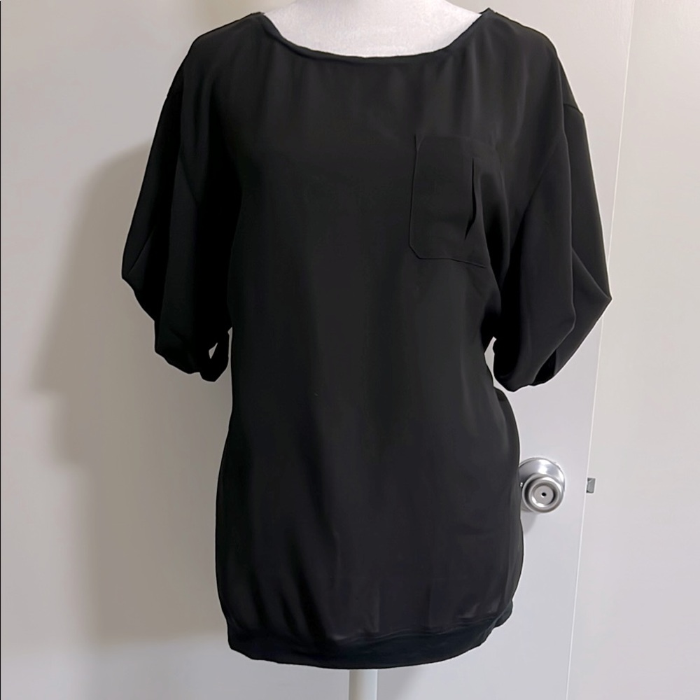 Ralph Lauren RLX Top with darted sleeve design, front pocket.